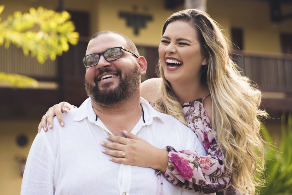 Couple smiling in outdoor courtyard